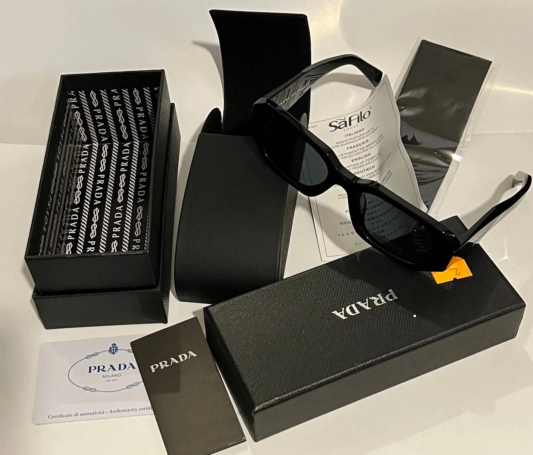 Prada SPR 17W-F Sunglasses 51mm - Elegant and Timeless Design