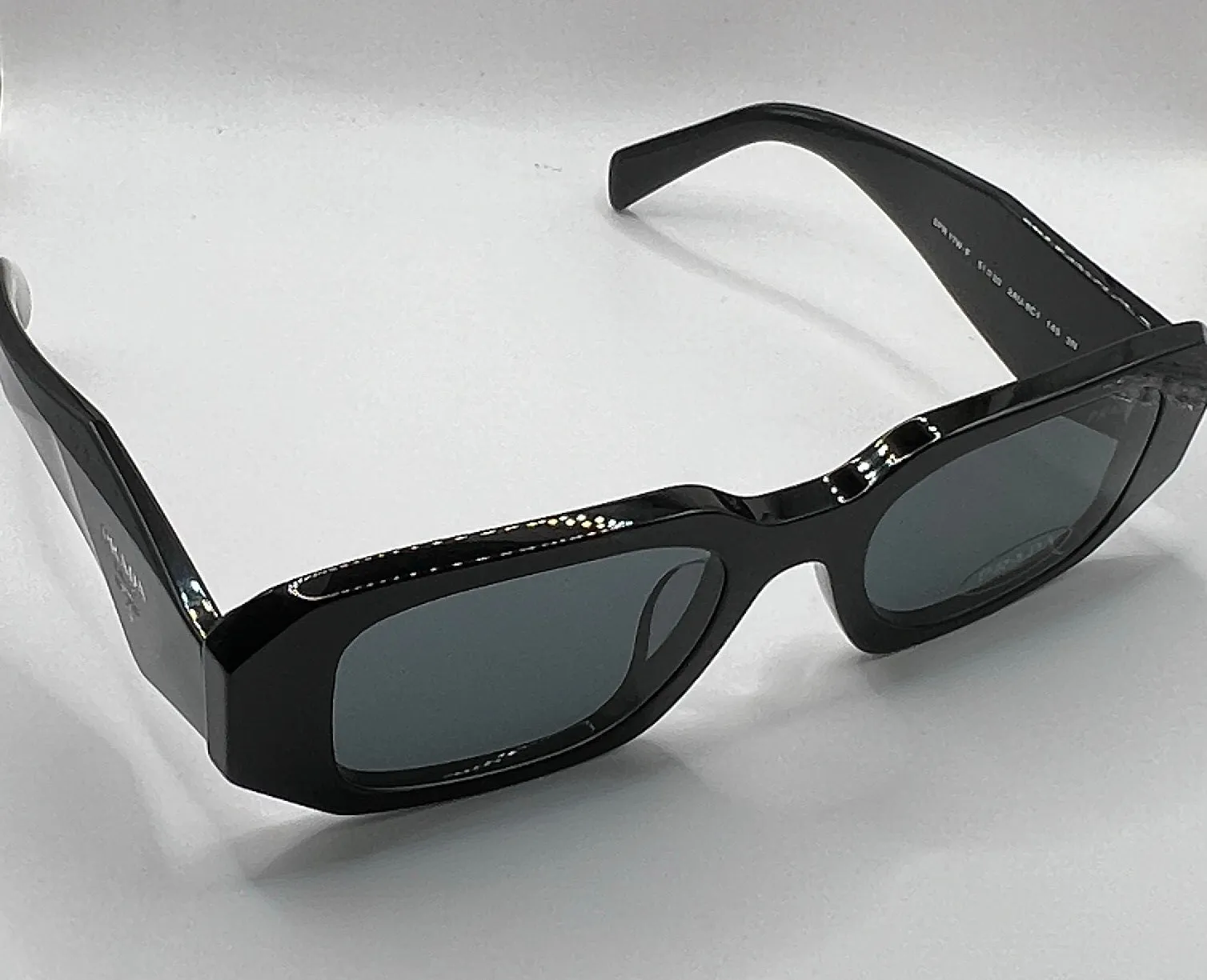 Prada SPR 17W-F Sunglasses 51mm - Elegant and Timeless Design