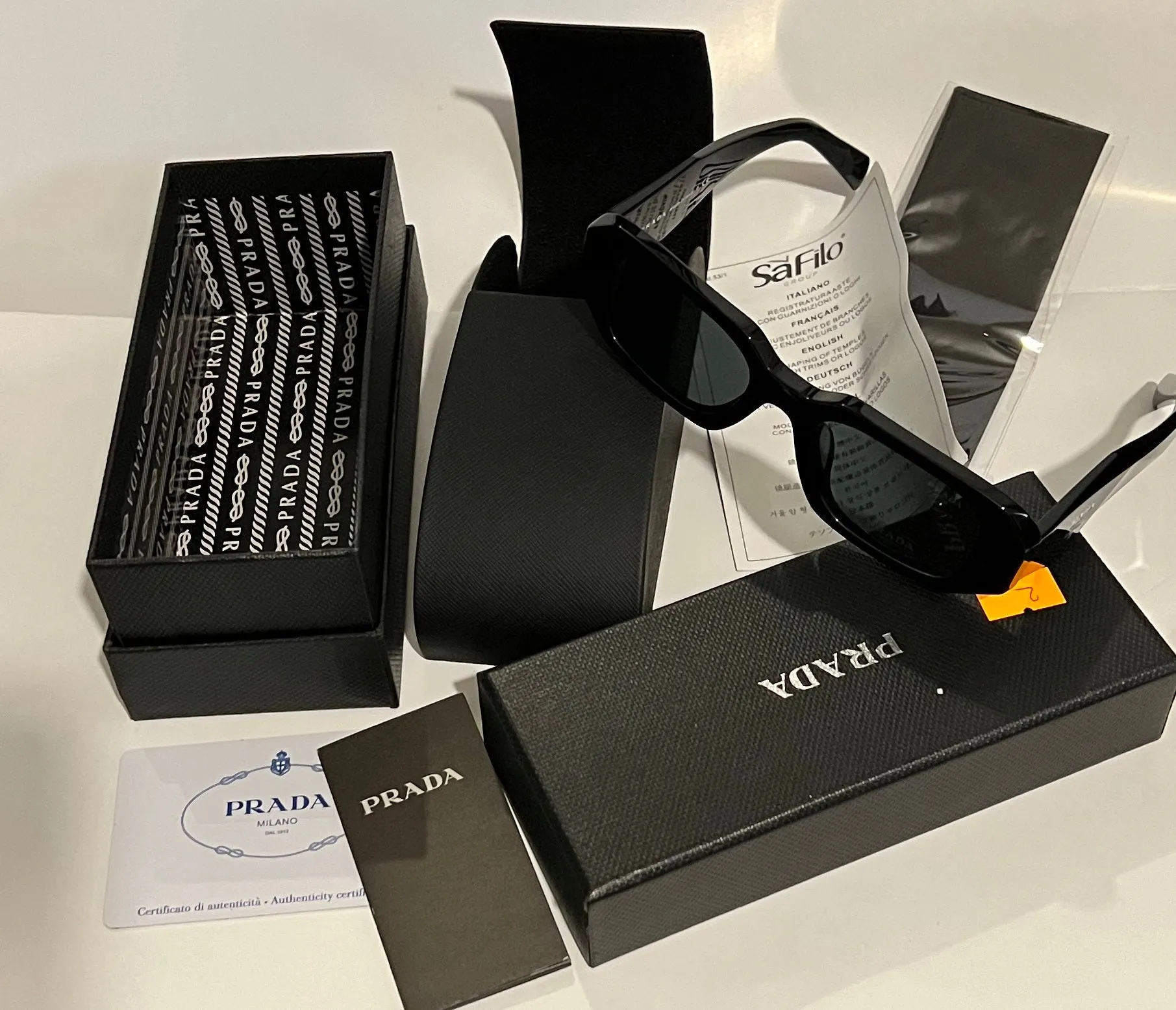 Prada SPR 17W-F Sunglasses 51mm - Elegant and Timeless Design